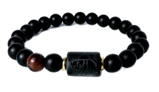 Czarna bransoletka kulkowa z obsydianu i skały wulkanicznej, z motywem znaku zodiaku byk