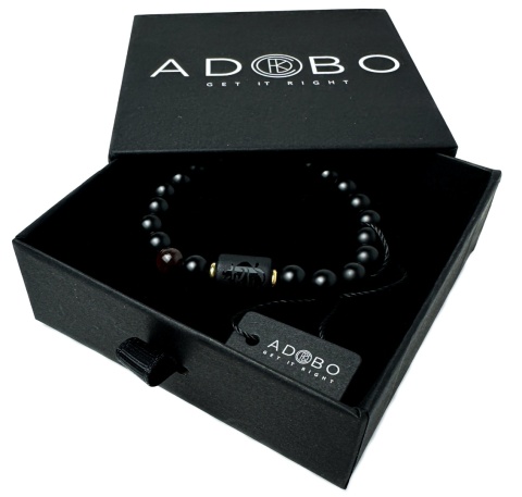 Czarna bransoletka kulkowa z obsydianu i skały wulkanicznej, z motywem znaku zodiaku byk